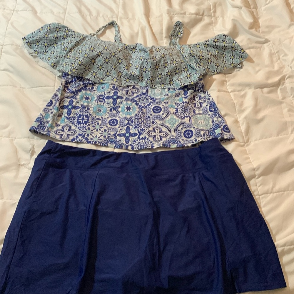 Two piece tankini. Straps can be removed or made into a halter.